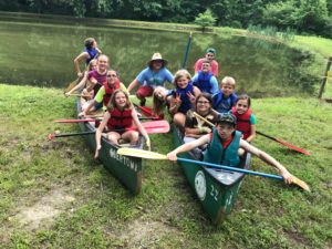 Junior campers in canoe