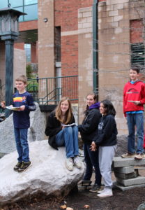 -H youth stop to pose on Appalachian State University’s campus after a geology field trip. Geologists spoke about their field’s work and education during a tour and hands-on laboratory activities.
