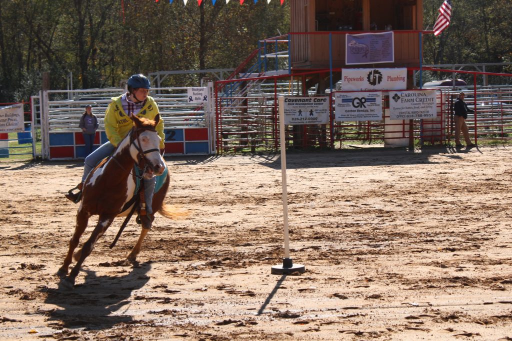 Kate Black of the 4-H Saddle Club competes at the 2019 fall horse show, opening herself up to healthy risk in a positive, controlled atmosphere.