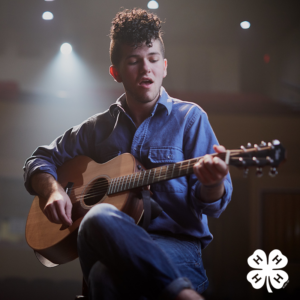 Youth performer with guitar