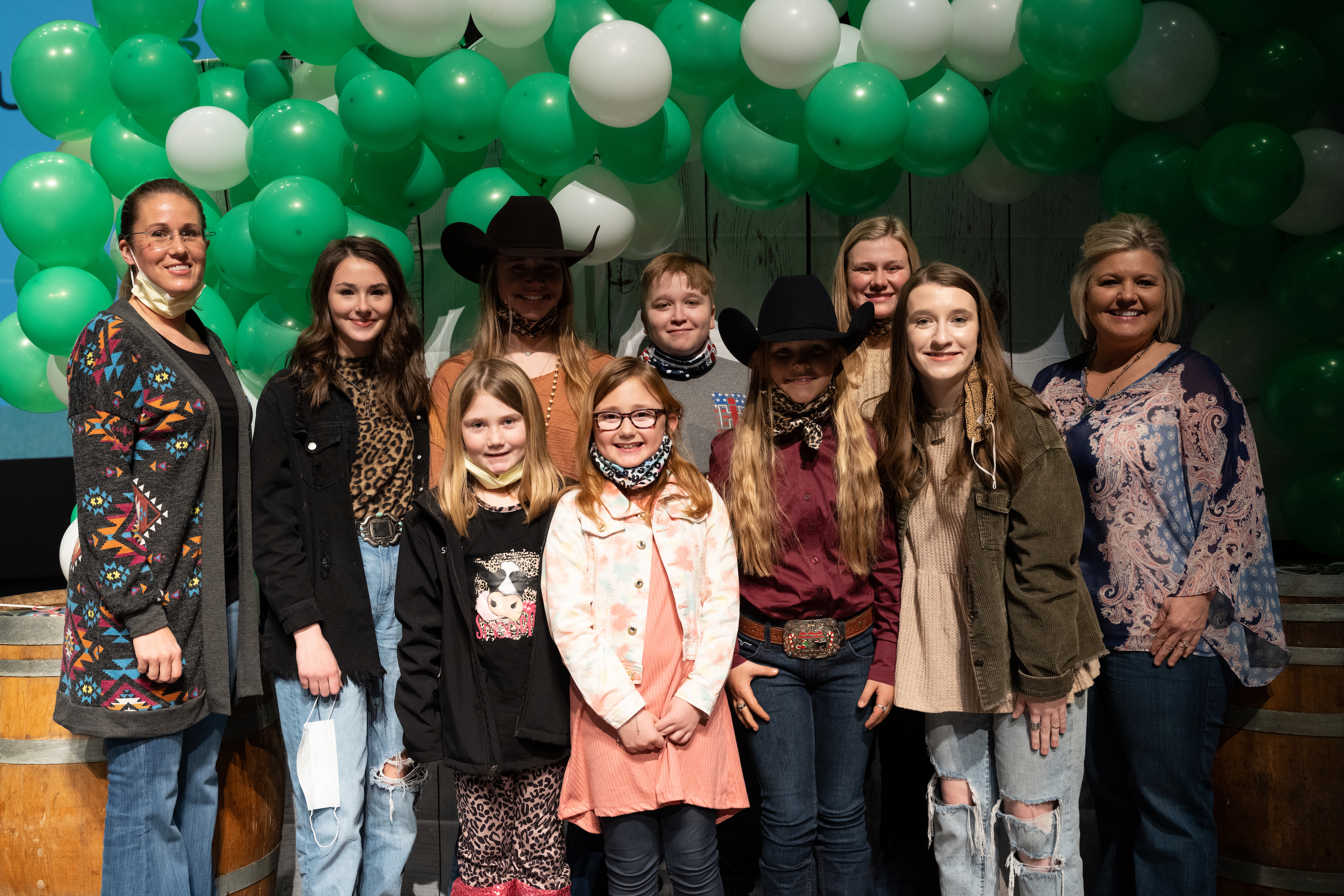 Members and leaders of the Livestock 4-H Club pose together at 4-H Achievement Night.