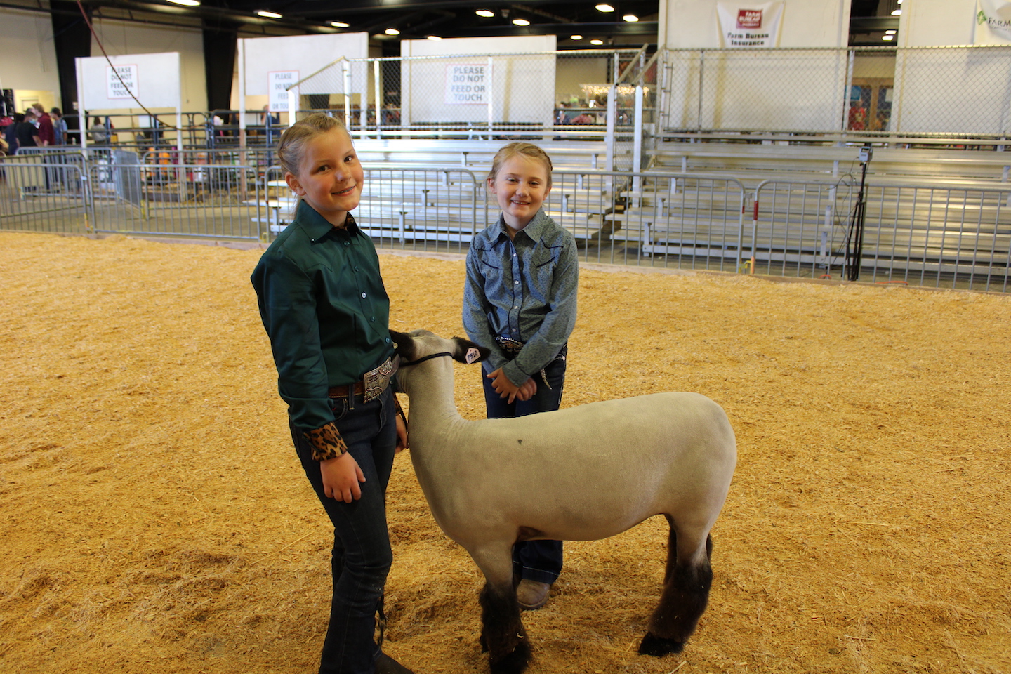 4-H members pose after the sheep show at the 2021 state fair.