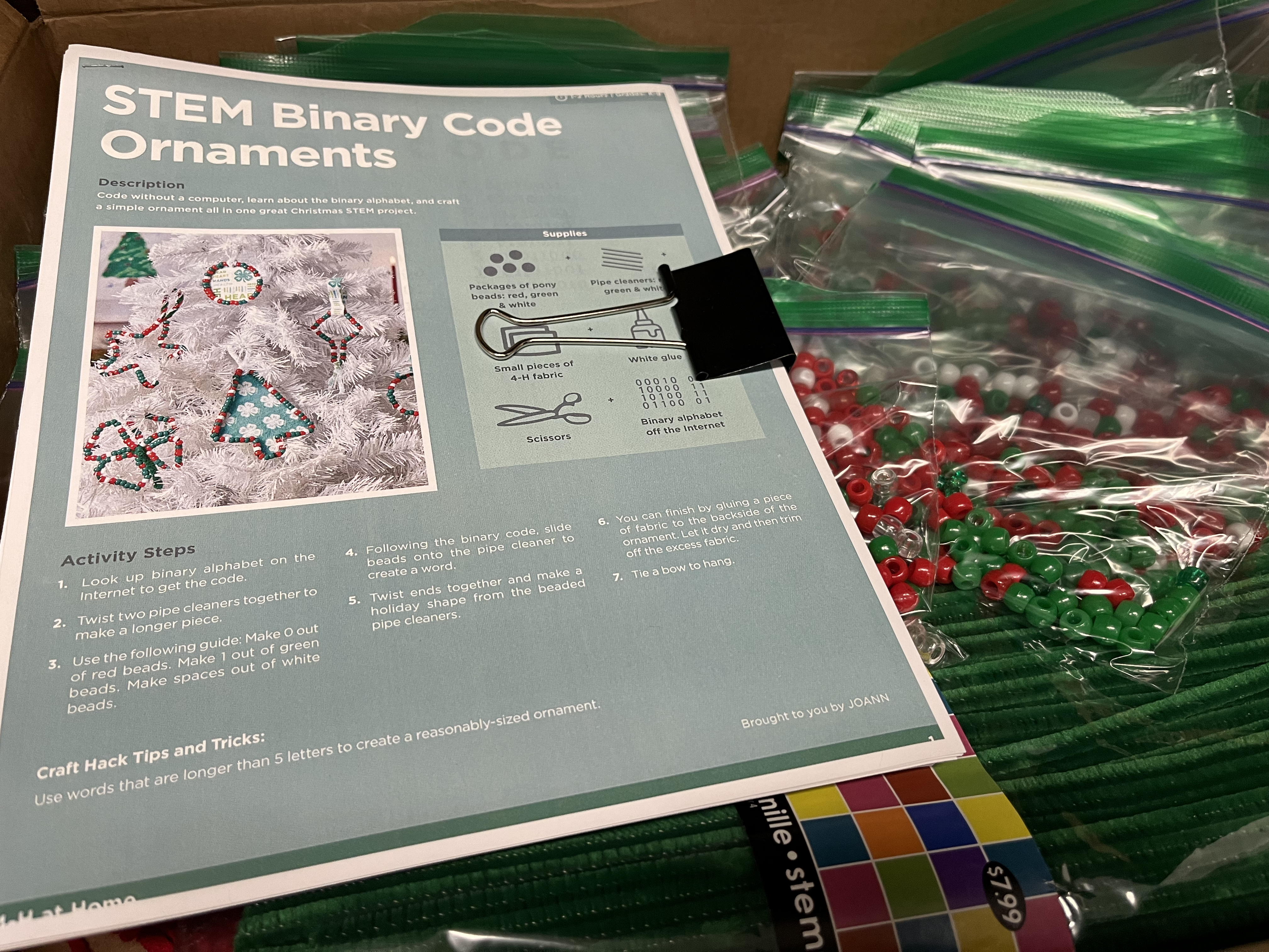 Making binary code ornaments teaches youth about computer science. Ornament activity kits are available for pick at the N.C. Cooperative Extension office below the library in Lenoir.