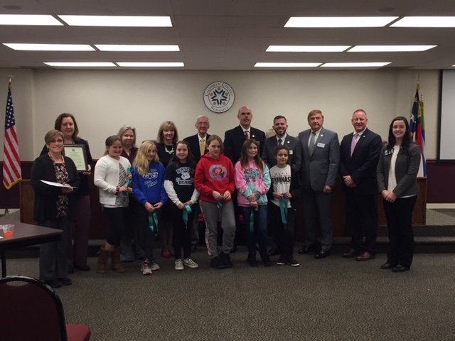 In 2019, the Baton Elementary Bear Paws 4-H Club was recognized by the Caldwell County board of education for their youth development efforts. Janie Rickman and Laura Arizmendi, both retiring education professionals, are pictured on the left side of the group.