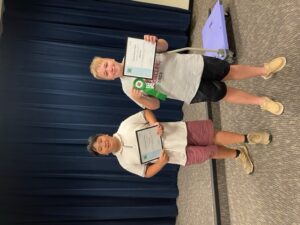 Thang Pham and Eli Dillion pose proudly with their awards from NC 4-H Electric Congress.