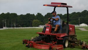 Marty Parrish mowing plots at the NC State University Lake Wheeler Turfgrass Research Lab.